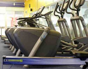 bikes-300x236 Photo showing a row of cross trainers and exercise bikes, by Flickr user sirwiseowl, shared under creative commons.